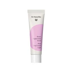 Weiße Tube mit rosafarbenem Etikett für leichte Rosencreme von Dr. Hauschka.